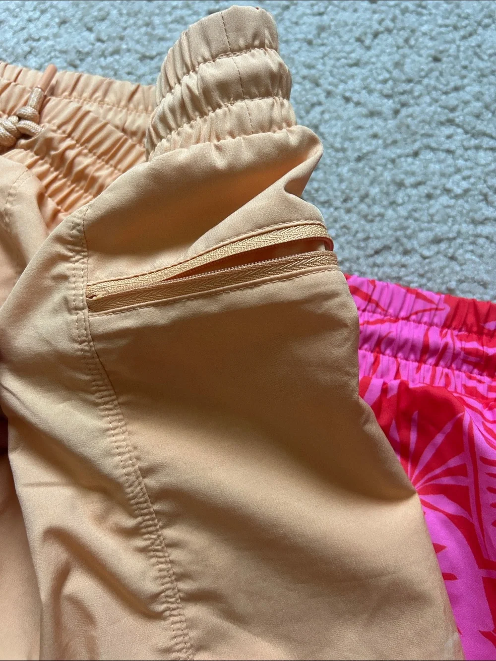 Pair of old navy active quick dry shorts-light orange and bright tropical pink